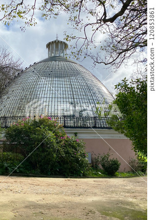 Glass roof dome of greenhouse consisting of rectangular panels in the park of Lisbon, Portugal Glass roof dome of greenhouse consisting of rectangular panels in the park of Lisbon, Portugal 120853861