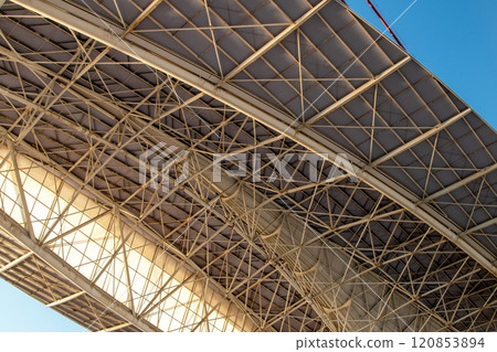 Unusual metal construction, modern architecture 120853894