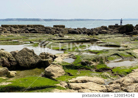 Rocky coast of the Baltic Sea in cloudy weather. View from the shore. Rocky coast of the Baltic Sea in cloudy weather. View from the shore. 120854142