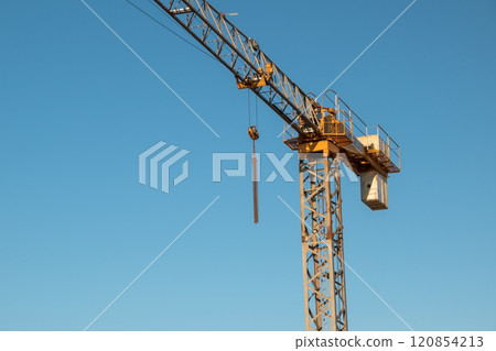 Cranes against the blue sky 120854213