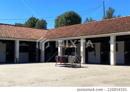 stable paddock with sand, training ground, horse club, sand stadium for horseback riding, horse home, Lisbon, Portugal stable paddock with sand, training ground, horse club, sand stadium for horseback riding, horse home, Lisbon, Portugal 120854591