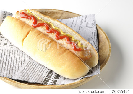 Hot dog with ketchup and mustard on a white background 120855495