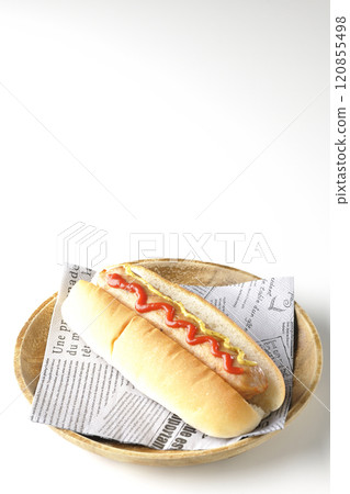 Hot dog with ketchup and mustard on a white background 120855498