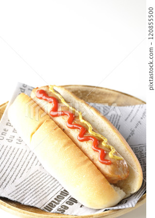 Hot dog with ketchup and mustard on a white background Hot dog with ketchup and mustard on a white background 120855500