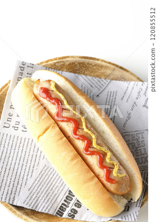 Hot dog with ketchup and mustard on a white background Hot dog with ketchup and mustard on a white background 120855512