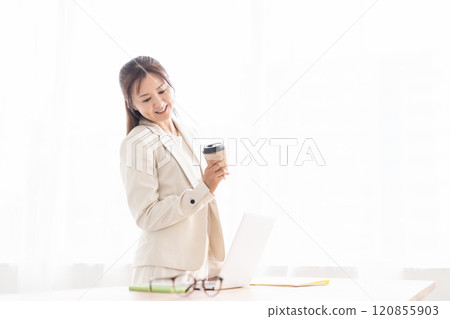 Smiling woman, business, computer, break Smiling woman, business, computer, break 120855903