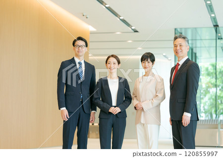 Business people lined up in the office Business people lined up in the office 120855997