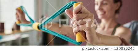 Exercising With Resistance Bands at Home for Strength Training 120856245