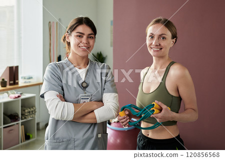 Portrait of Smiling Female Healthcare Worker and Patient Exercising Portrait of Smiling Female Healthcare Worker and Patient Exercising 120856568