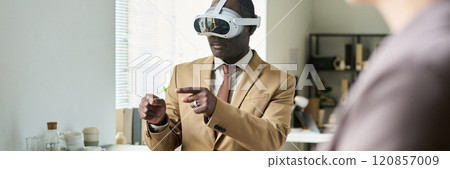 Mature man in virtual reality headset Mature man in virtual reality headset 120857009