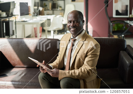 Businessman with financial documents Businessman with financial documents 120857051