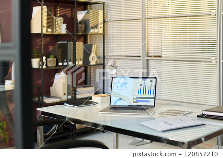 Laptop with graphic data on screen 120857210