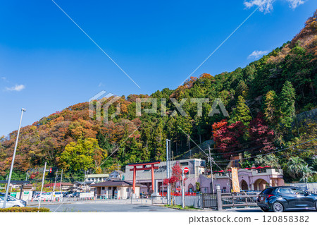 Keio Line: Autumn in front of Takaosanguchi Station, Hikawa Shrine Torii Keio Line: Autumn in front of Takaosanguchi Station, Hikawa Shrine Torii 120858382