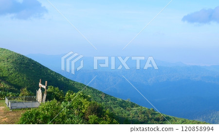 A beautiful landscape of mountains and a bright blue sky A beautiful landscape of mountains and a bright blue sky 120858994