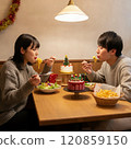 Men and women having a Christmas party 120859150