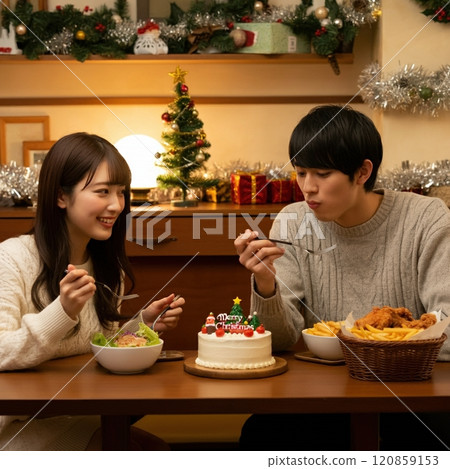 Couple eating Christmas cake 120859153