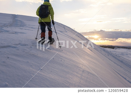 Image of snowshoe trekking Snow scene of Tottori Sand Dunes Image of snowshoe trekking Snow scene of Tottori Sand Dunes 120859428