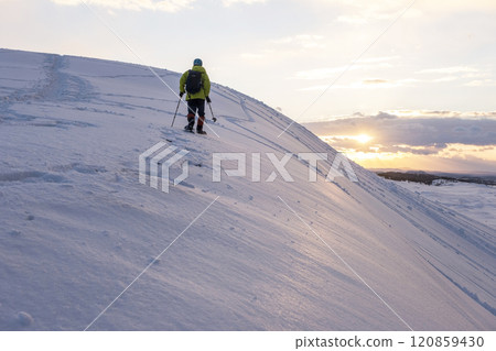 Image of snowshoe trekking Snow scene of Tottori Sand Dunes Image of snowshoe trekking Snow scene of Tottori Sand Dunes 120859430