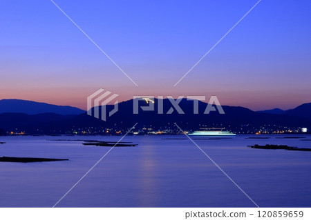 The character "man" lit up on Mount Hono during the New Year holidays (Higashihiroshima City) 120859659