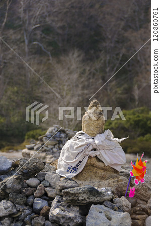 Scenery of sacred mountain Osorezan: Buddha statue and windmill 120860761