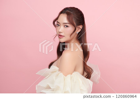 Beautiful young asian woman with clean fresh skin on pink background, Face care, Facial treatment, Cosmetology, beauty and spa, Asian women portrait. Beautiful young asian woman with clean fresh skin on pink background, Face care, Facial treatment, Cosmetology, beauty and spa, Asian women portrait. 120860964