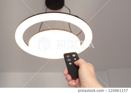 LED ceiling light with smart remote control. Energy saving. Clean planet and environmental protection. LED ceiling light with smart remote control. Energy saving. Clean planet and environmental protection. 120861157