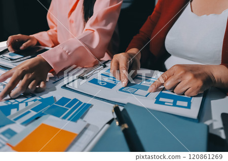 Young Asian business creative team work together, mobile application software design project. Brainstorm meeting, internet technology, smartphone web app designer, office coworker teamwork concept 120861269