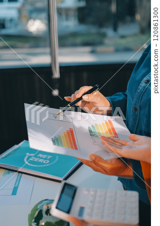 ESG environmental social governance display on laptop on eco-friendly company meeting with business people implementing environmental protection for clean and sustainable future ecology. Trailblazing 120861300