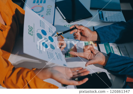 ESG environmental social governance display on laptop on eco-friendly company meeting with business people implementing environmental protection for clean and sustainable future ecology. Trailblazing 120861347