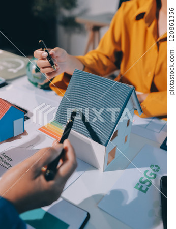 ESG environmental social governance display on laptop on eco-friendly company meeting with business people implementing environmental protection for clean and sustainable future ecology. Trailblazing 120861356