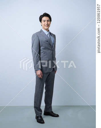 Full body of a handsome man in a business suit Full body of a handsome man in a business suit 120861957