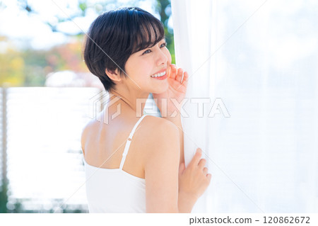Young woman doing skin care at home Young woman doing skin care at home 120862672