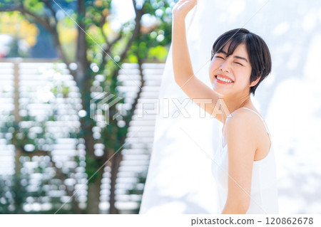 Young woman doing skin care at home 120862678