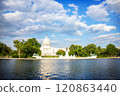 The United States Capitol building reflected on the reflection pool on a sunny day at nation mall, Washington DC, USA. 120863440