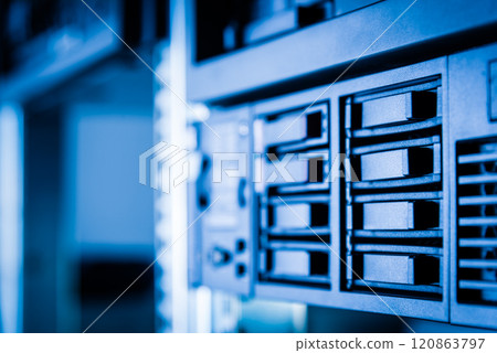 cluster of data storage SSD hard drives inside server rack 120863797