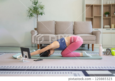 fitness ,workout, home exercise ,lifestyle and healthy concept.Woman in exercise gear. fitness ,workout, home exercise ,lifestyle and healthy concept.Woman in exercise gear. 120865323