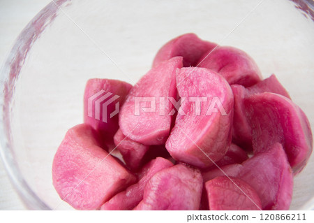 Atsumi turnip pickles served in a glass bowl 120866211
