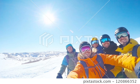Friends smile brightly snowshoeing in a stunning winter landscape on a sunny day, enjoying their adventure 120866352