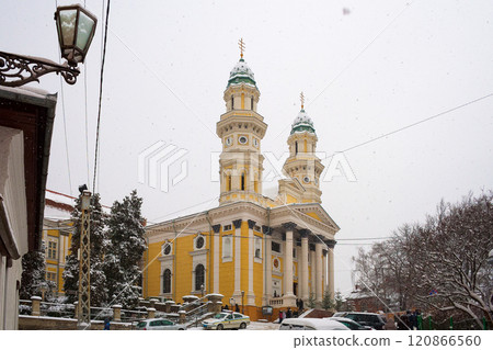 uzhhorod, ukraine - 12 jan, 2013: holy cross cathedral in winter. cloudy day, snowy weather. baroque church of 17s century uzhhorod, ukraine - 12 jan, 2013: holy cross cathedral in winter. cloudy day, snowy weather. baroque church of 17s century 120866560