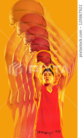 Basketball player preparing to shoot, holding ball high, on vibrant yellow background. Stroboscopic effect highlights phases of motion, emphasizing focus and precision. Basketball player preparing to shoot, holding ball high, on vibrant yellow background. Stroboscopic effect highlights phases of motion, emphasizing focus and precision. 120867922
