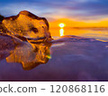 Frosty air and frozen lake surface in a beautiful sunset landscape. Beautiful ice shapes and sunlight. Photo from Sotkamo, Finland. 120868116