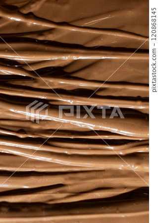 Macro Texture Natural Melted Milk Chocolate Top View 120868145