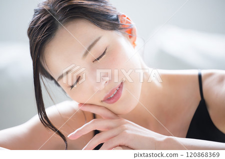 Close-up of a beautiful skinned woman who cares about skin care. Sexy beautiful bare skin and skin texture with eyes closed Close-up of a beautiful skinned woman who cares about skin care. Sexy beautiful bare skin and skin texture with eyes closed 120868369