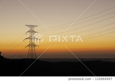 Sunset sky and electricity transmission tower Sunset sky and electricity transmission tower 120868947
