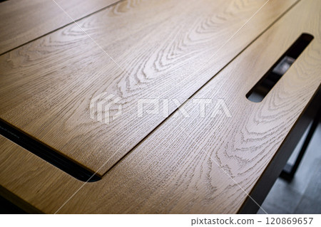 Empty rough wooden table top in the dark room 120869657