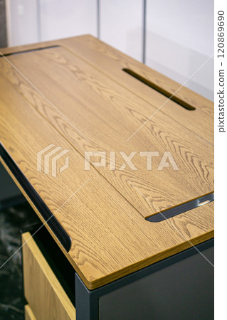 Empty rough wooden table top in the dark room Empty rough wooden table top in the dark room 120869690
