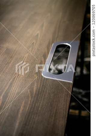 Empty rough wooden table top in the dark room 120869705