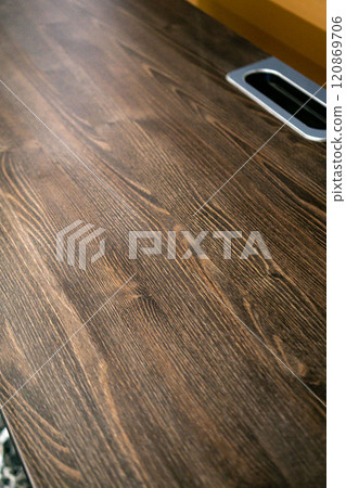 Empty rough wooden table top in the dark room Empty rough wooden table top in the dark room 120869706