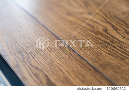 Mobile phone with wireless charger on table. Modern workplace accessory 120869822