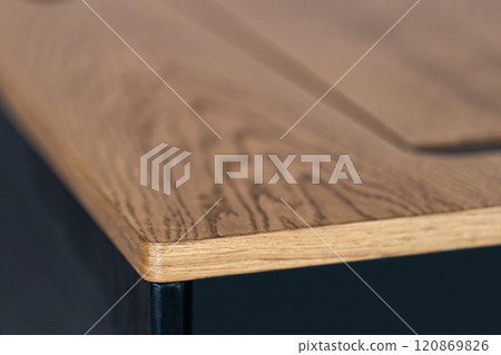 Mobile phone with wireless charger on table. Modern workplace accessory Mobile phone with wireless charger on table. Modern workplace accessory 120869826